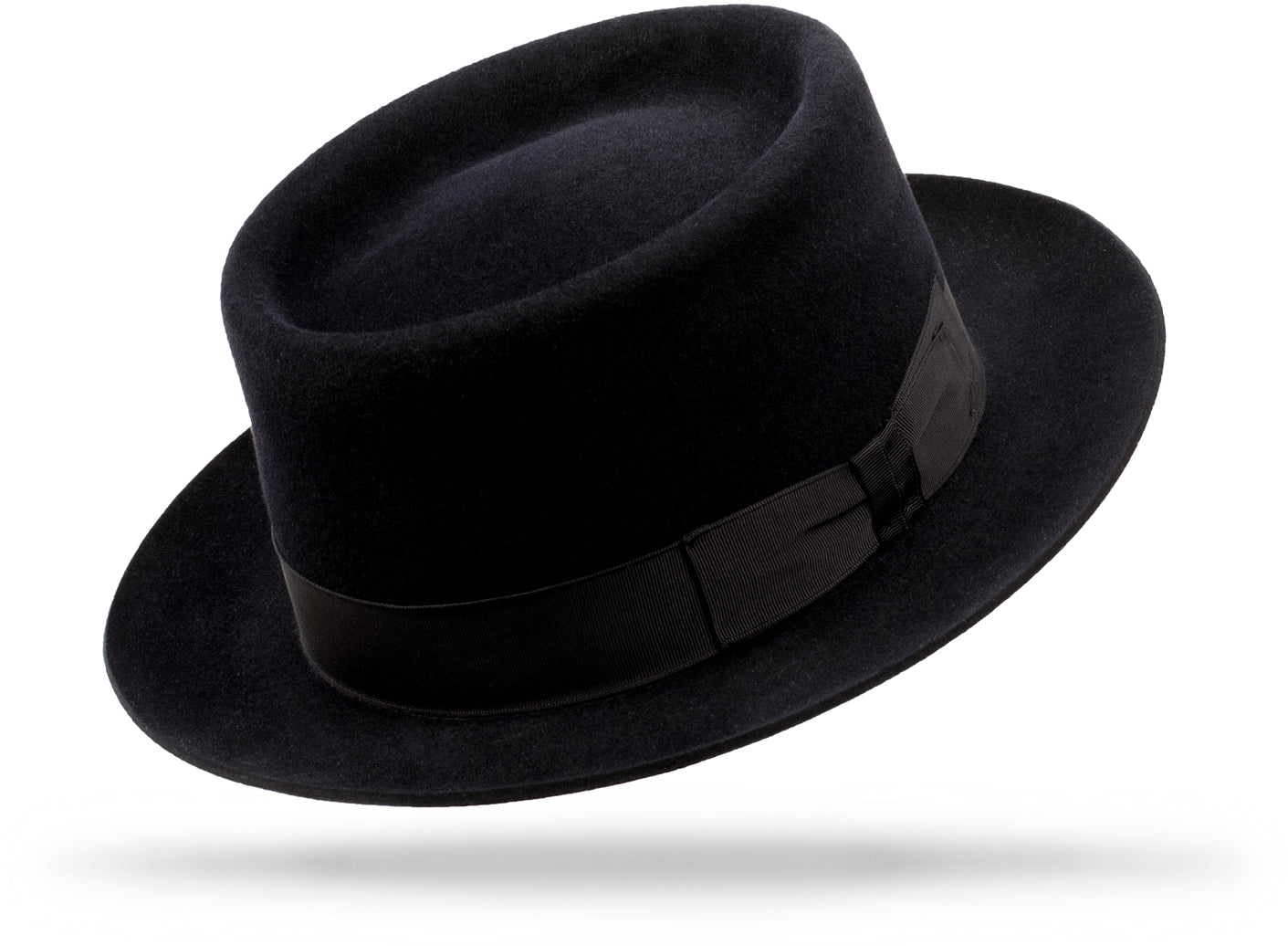 Design
A handcrafted felt porkpie design that is simple and classical.
Material
100% Hare Fur Felt sustainably acquired
Specifications
100% Hare Fur Felt. 3 1/2” crown and 2 1/4” brim that possesses a smart snap in the front. Comes standard with a 1 black band. Handcrafted in our NYC Atelier.
