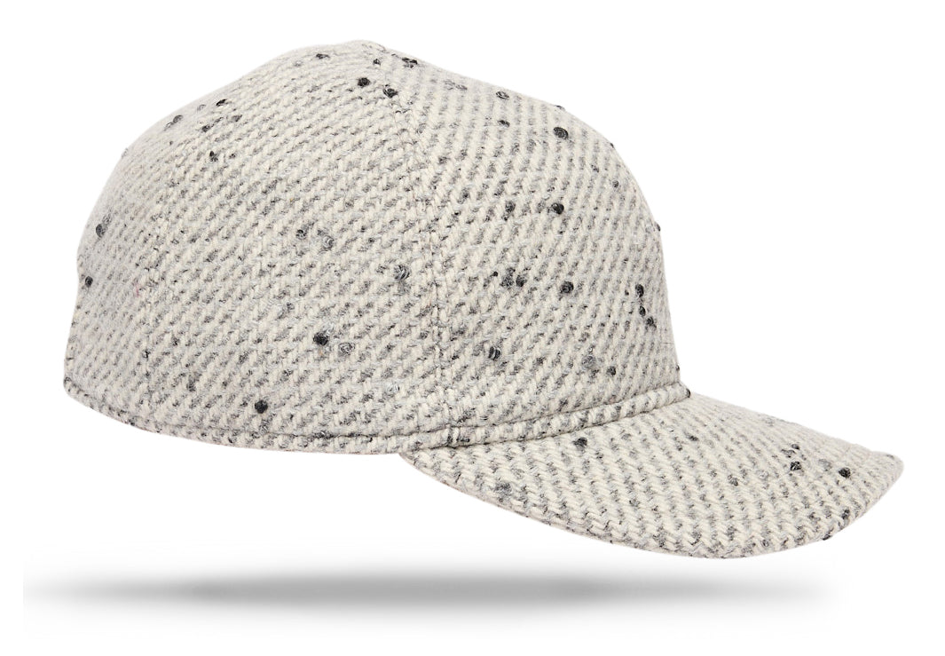  
Design
A refined and upgraded version of a timeless baseball cap for a modernized sportswear aesthetic. Crafted from 100% wool, this elevated yet casual cap is constructed from six panels with a curved brim. The perfect casual-luxe accessory for any ensemble. 
* The model is wearing the beige color Cap. 
Material
100% wool. 
Specifications
- 100% wool fully lined.- Handmade in Italy for Worth & Worth.