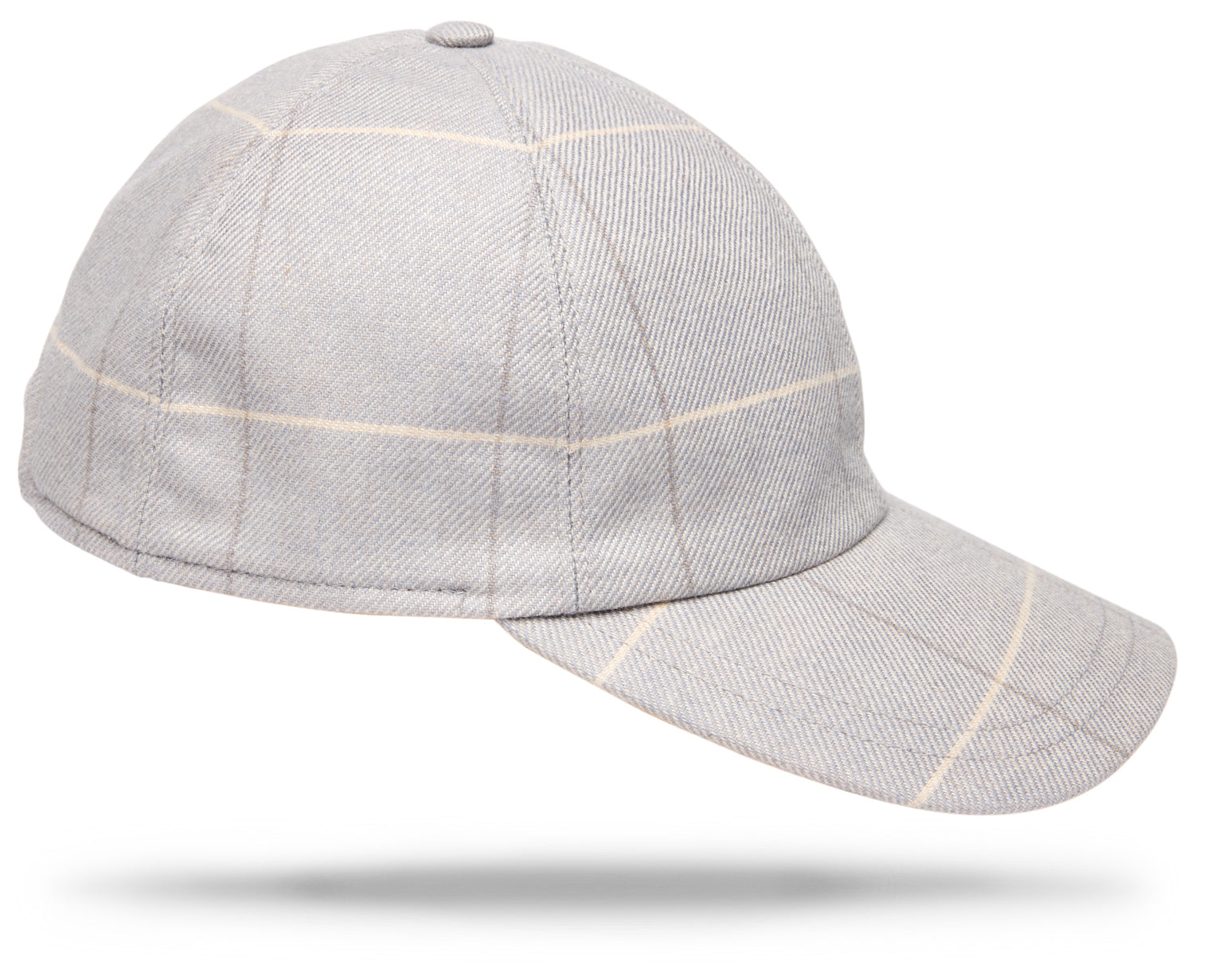 Design
A luxurious blend of merino wool, silk and cashmere, selected by Worth & Worth for its exceptional softness, warmth and subtle texture.Woven in County Donegal, Ireland, drawing on generations of textile expertise, the cloth is then brought to Italy, where each cap is handmade by skilled artisans.A refined interpretation of the timeless baseball cap, balancing a modern sportswear sensibility with exceptional materials and craftsmanship. Constructed from six panels with a curved brim, it brings understated luxury to an effortless, everyday silhouette.
Material
75% Merino Wool 15% Silk 10% Cashmere  
Specifications
- 75% Merino Wool - 15% Silk- 10% Cashmere- Fully lined.- Woven in Ireland - Handmade in Italy for Worth & Worth.