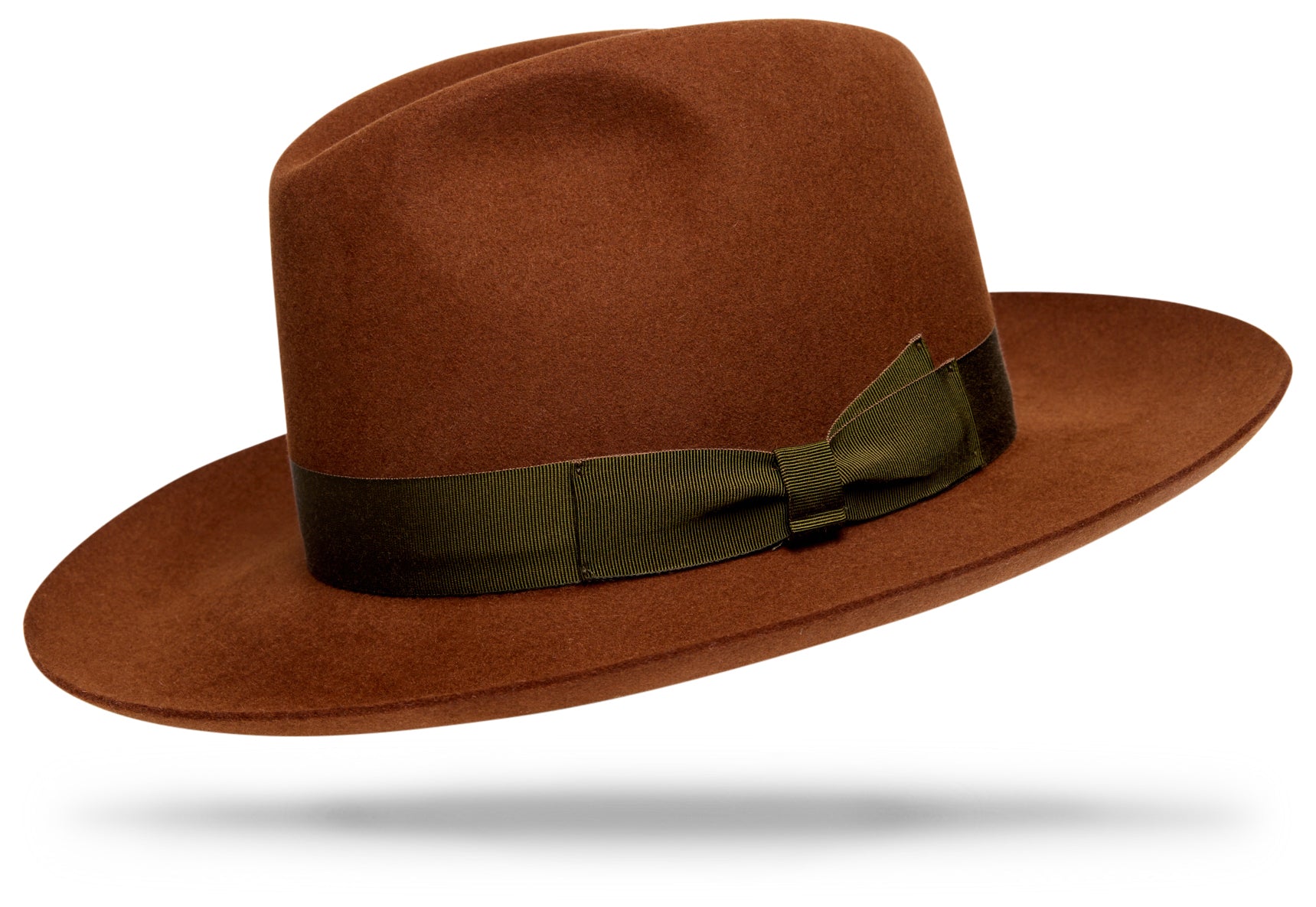 Design
Our new spin on our timeless classic, the Sienna carries a 4 C-crown and holds a 3 snap brim. Should be a staple in your wardrobe.
Material
Fur felt, sustainably acquired.
Specifications
A 115-gram fur felt beauty. The Sienna holds a 3 snap brim with a classic 4 C-crown. A refined chestnut, harmonized with an olive double bow hatband.Handcrafted in our NYC atelier.