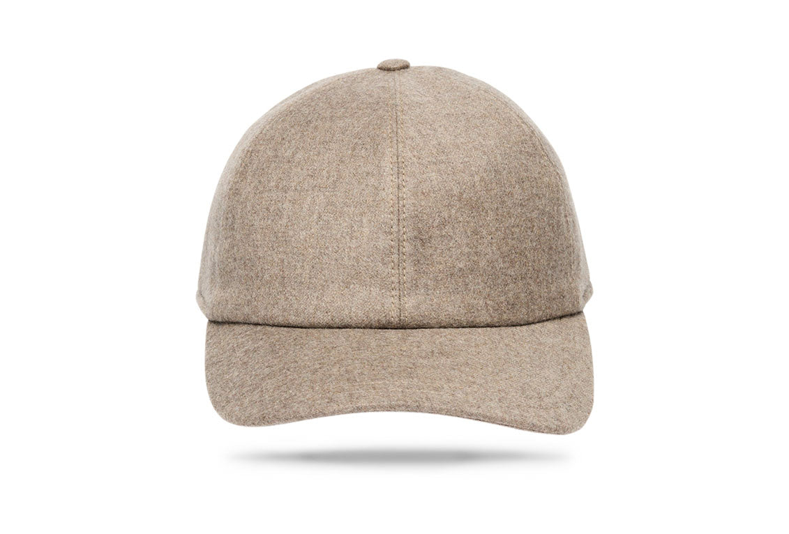 
Design
A refined and upgraded version of a timeless baseball cap for a modernized sportswear aesthetic. Crafted from 100% wool, this elevated yet casual cap is constructed from six panels with a curved brim. The perfect casual-luxe accessory for any ensemble. 
Material
100% wool. 
Specifications
100% wool fully lined.Handmade in Italy for Worth & Worth.
