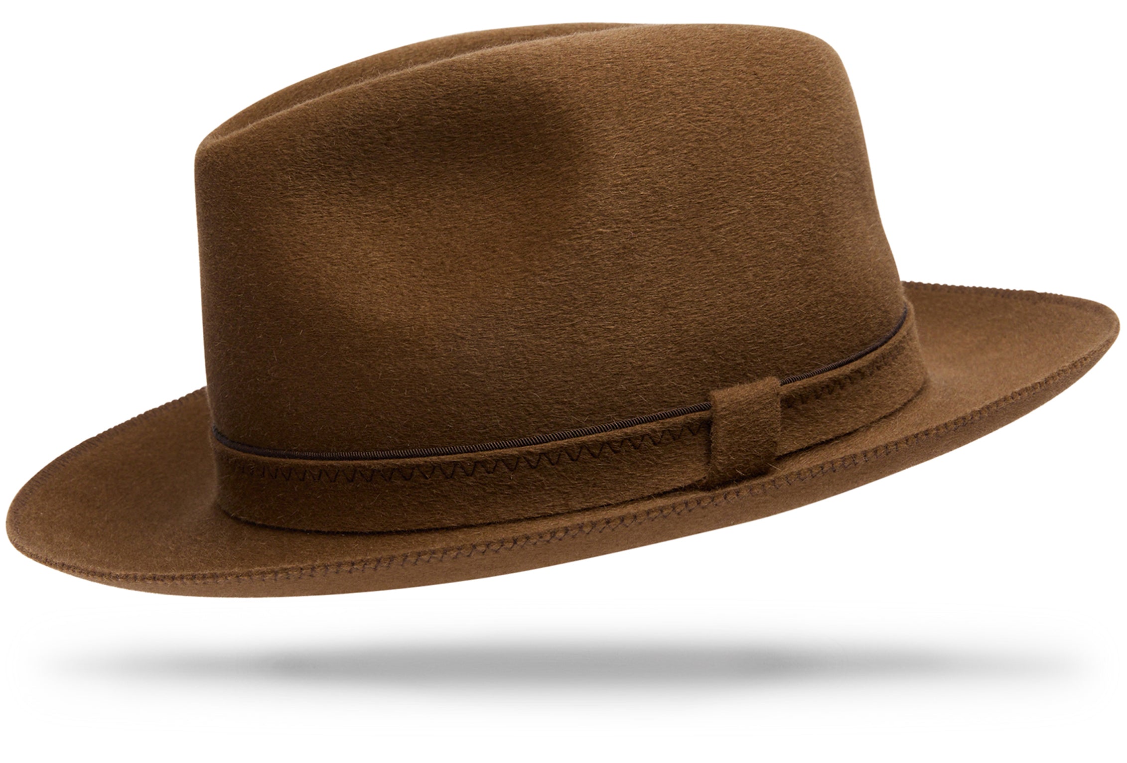 Design
A brown Italian cashmere hat with rich caramel undertones.Made of 100% lustrous cashmere, the Firenze fully embodies luxury chic.
Material
100% Italian cashmere
Specifications
- The felt-on-felt hatband with its contrast complimentary edging takes a detail-oriented to the next level while the 2 3/8” brim and moderate crown effortlessly exude quality. - Handmade in our atelier in NYC.