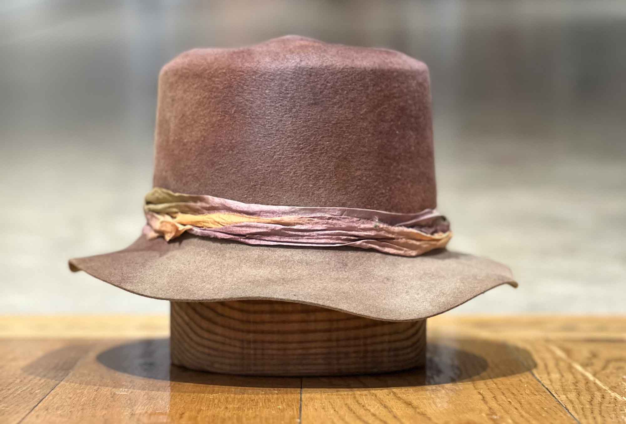 Design
A hat, subtle enough that just by touching it, the felt molds into any shape you desire. One unique piece is available for this Bucket Hat, size 6 7/8, 55 cm. 
Material
100% Hare Fur Felt sustainably acquired, weather refined, and hand dyed. Our custom hats are hand dyed by using plant and vegetable base pigments.
Specifications
-  A 1 3/8 brim and a 4 crown. - This one of a kind piece is weather refined and has been edged and in a special dye treatment for over a year.- Ready to ship- Handmade in our atelier in NYC.