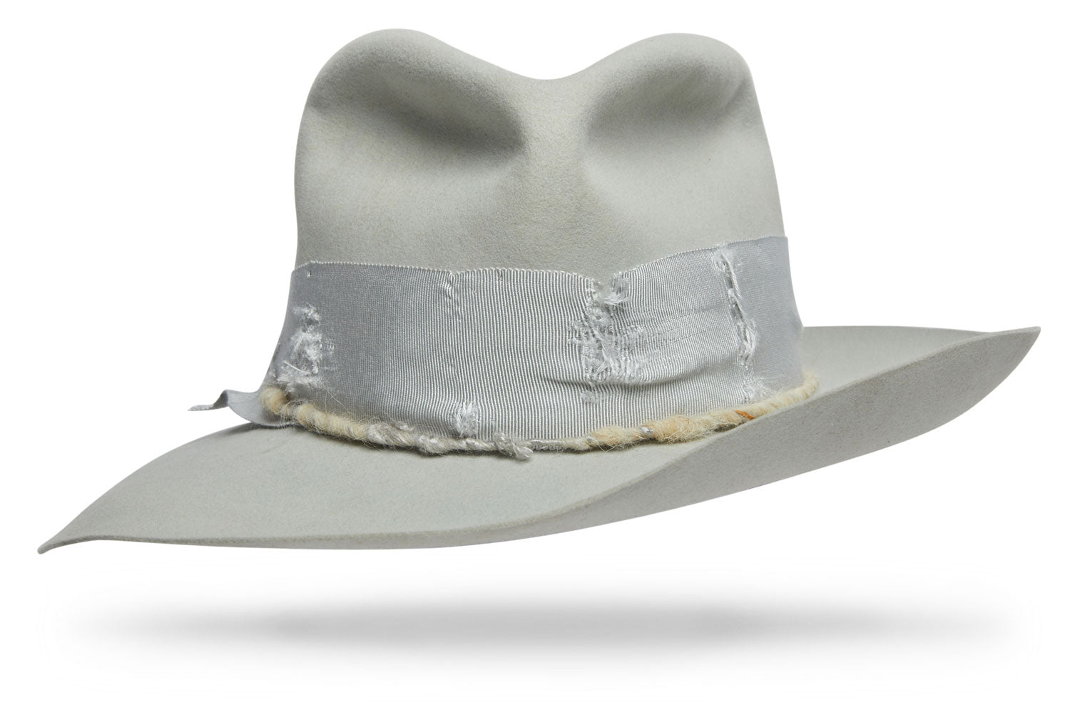 Design
With style and endurance, this Silver belly fur felt hat will make a statement anywhere you go. With its 3 ½ brim and 4” crown and a sharkskin finish that gives it a polished luster, the Charley is adorned with a 2”tone on tone distressed cotton grosgrain and finished off with an alpaca hand-rolled cord.
Material
100% Dressed Beaver fur felt hat sustainably acquired
Specifications
- 2 ¾” brim and 4” crown made of 100% Beaver fur Felt sustainably acquired- Silver belly color - Adorned with a 2 tone on tone distressed cotton grosgrain - Finished of with an alpaca hand-rolled cord- Handmade in our atelier in NYC with love. 