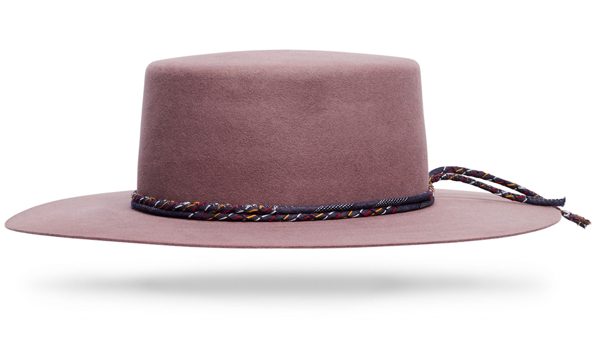 Design
A soft pastel mauve with pale hints of magenta.
Material
100% Light Weight Beaver blend sustainably acquired
Specifications
4 flat top bolero crown with 3 1/2 table top brim. Finished off with a hand-rolled pic stitched denim band. Handmade in our atelier in NYC. Please allow 4-6 weeks to custom make this special piece.