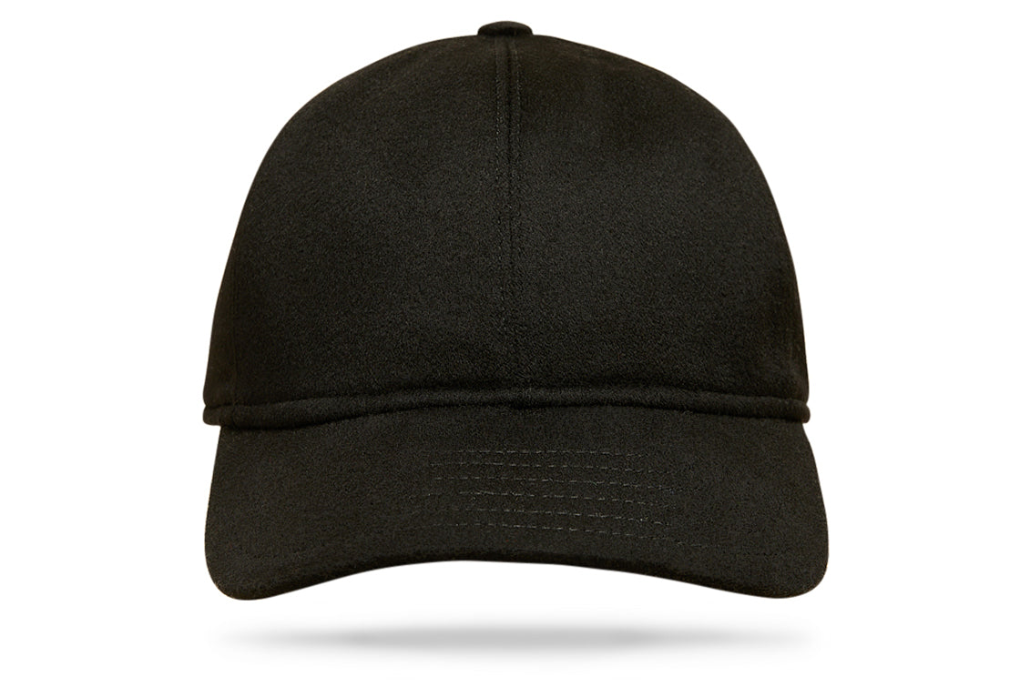 
Design
A refined and upgraded version of a timeless baseball cap for a modernized sportswear aesthetic. Crafted from 100% black cashmere, this exquisite cashmere cap is constructed from six panels with a curved brim and is thoroughly made waterproof and wind-resistant. Ideal for leisure time teamed with casual outerwear. The perfect casual-luxe accessory for any ensemble.
Material
100% cashmere rain waterproof.
Specifications
100% black cashmere.Rain waterproof fully lined for comfort.Handmade in Italy for Worth & Worth.
