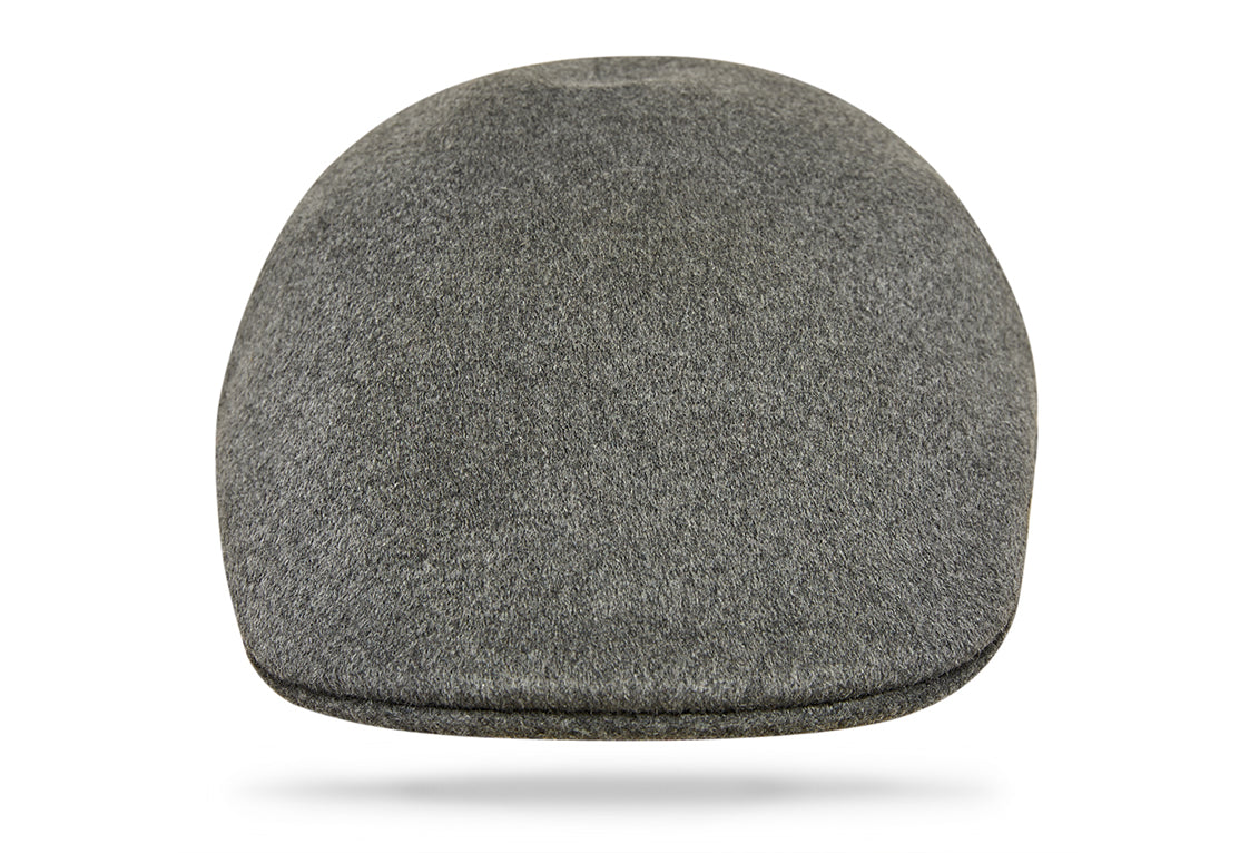 
Design
This 100% cashmere driver cap has a distinct look that never fails to set it apart. The ideal choice for crisp days or chilly nights.Timeless, understated, and defined by a sense of bold simplicity with luxurious cashmere for a soft, smooth feel.Thoroughly made waterproof and wind-resistant.
Material
100% cashmere rain waterproof.
Specifications
100% grey cashmere.Rain waterproof fully lined for comfort.Handmade in Italy for Worth & Worth.
