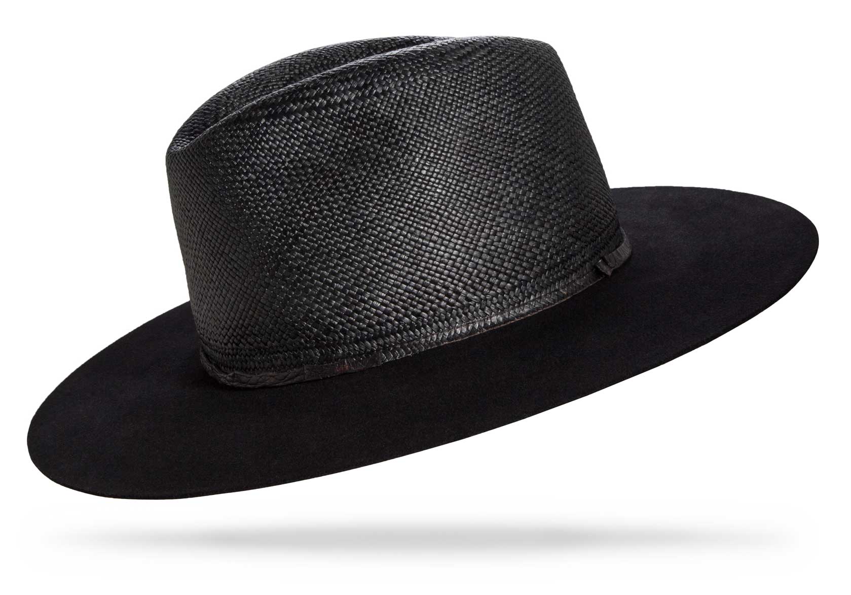 Design
The 3 shades of black. Black Cuenca Brisa weave, black Beaver Felt, and Black Croc Band. Black on Black on Black.
Material
Cuenca Brisa weave crown, 100% Western Beaver Fur Felt sustainably acquired for the brim, and Croc band.
Specifications
C semi teardrop 4 crown with a 3 1/4 Beaver Felt brim. Handmade in our atelier in NYC. Please allow 6-8 weeks to custom make this special piece.